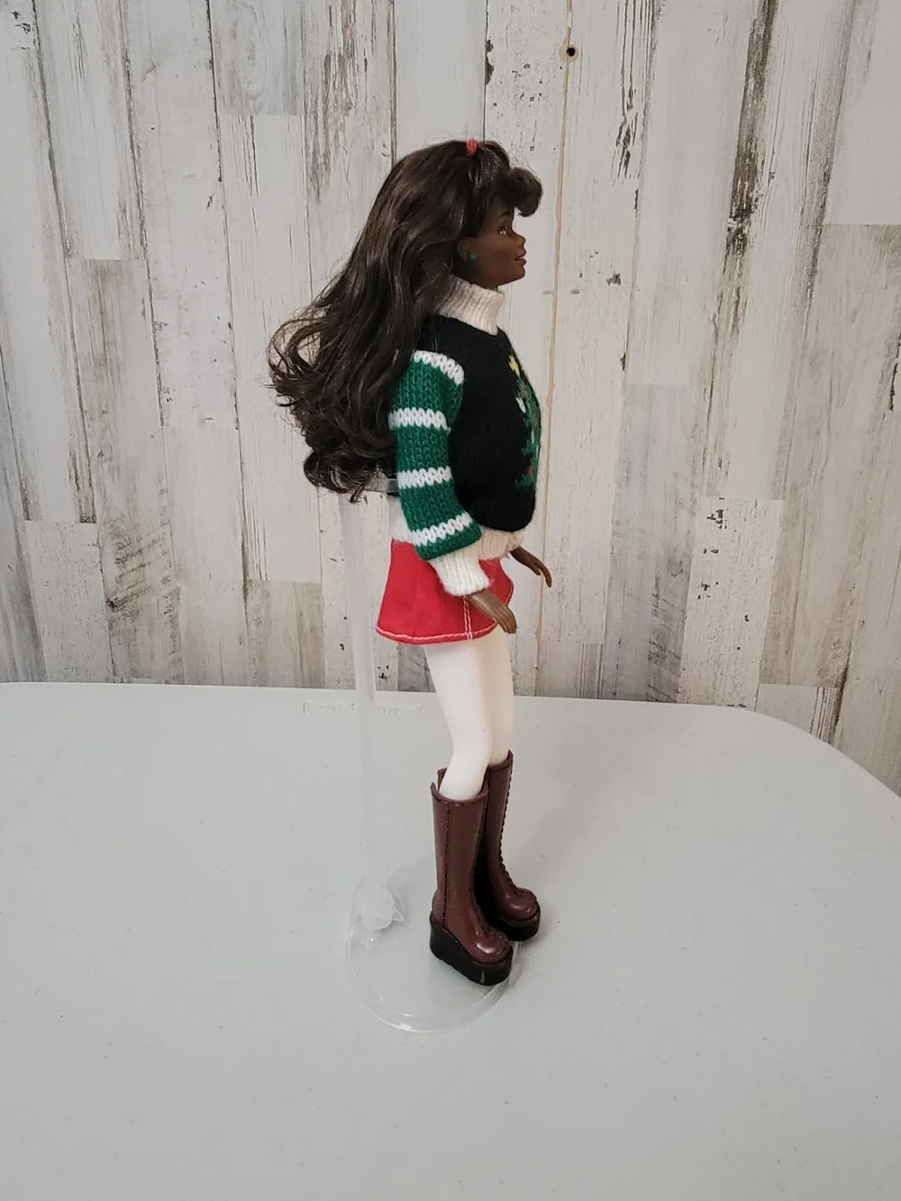 Brunette Doll with Green Stud Earrings and White Turtleneck